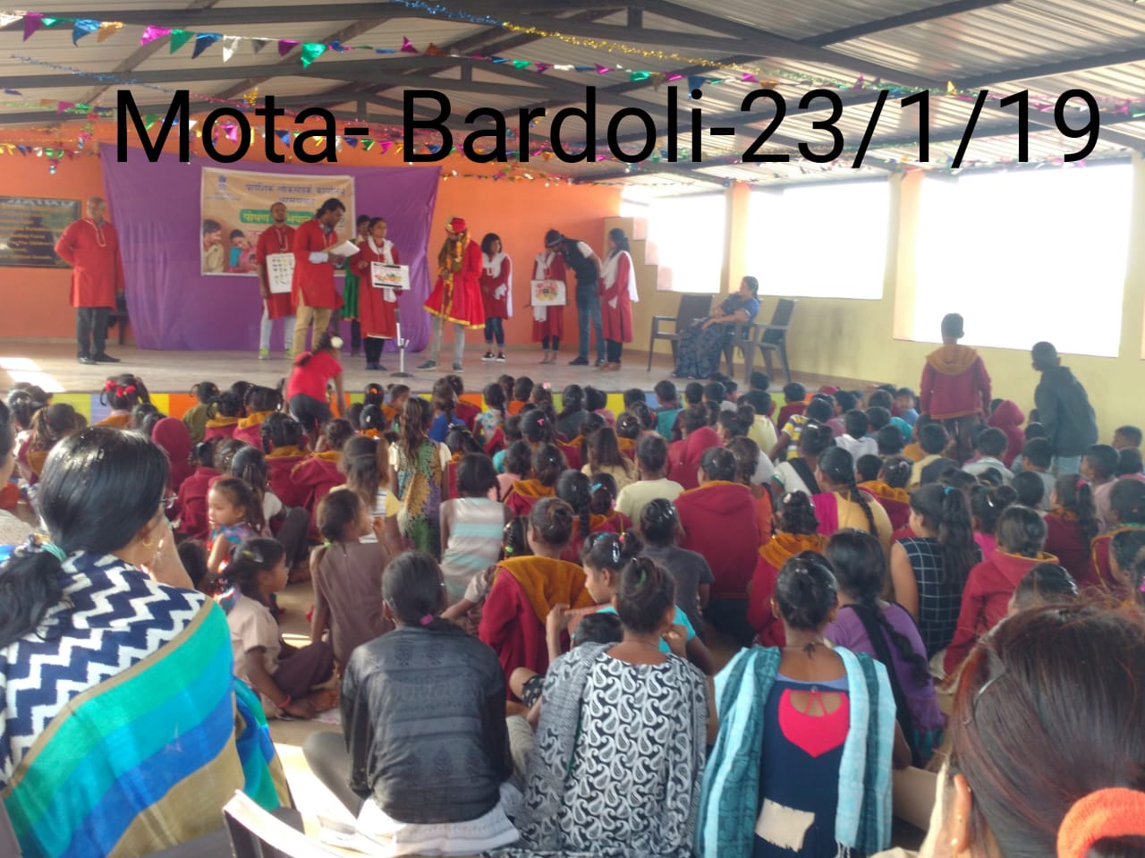 Navratri celebration with professional Garba dancers in colorful outfits